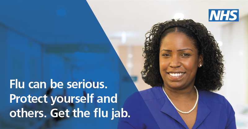 Woman who works for NHS encouraging flu jab with a smile