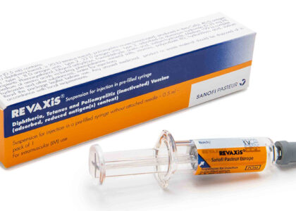 Syringe containing Revaxis vaccine, a combination vaccine for diphtheria, tetanus, and polio, ready for injection.